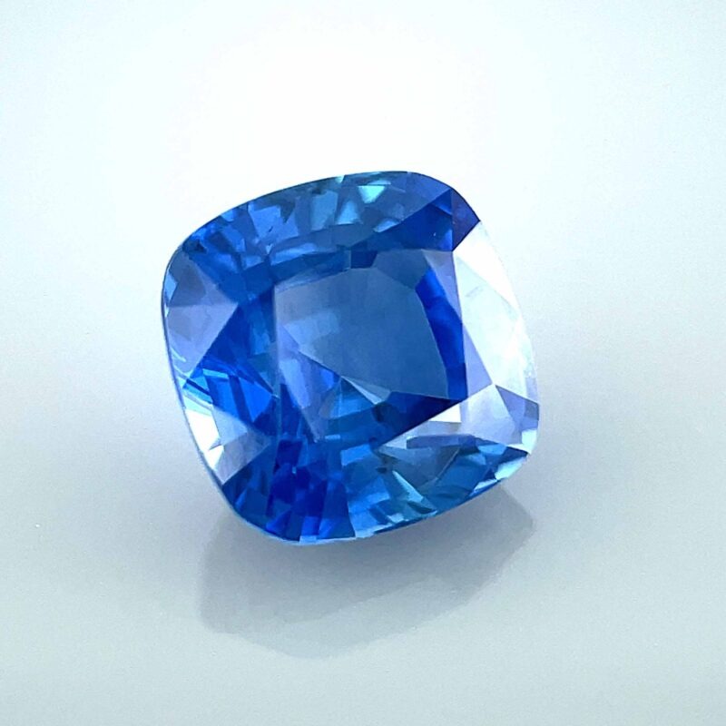 unheated blue sapphire cushion cornflower