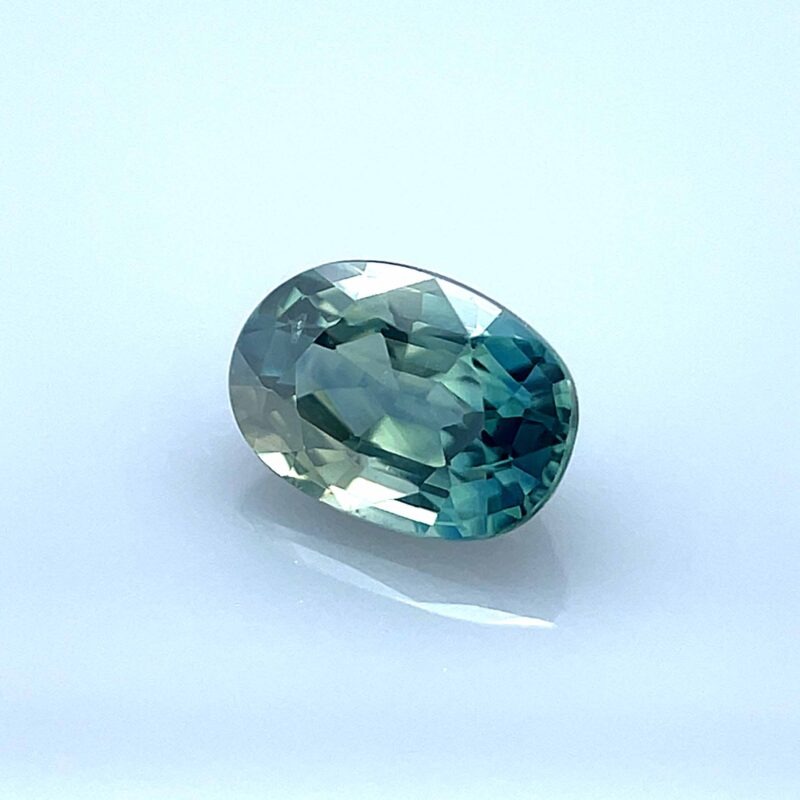 natural teal sapphire oval cut
