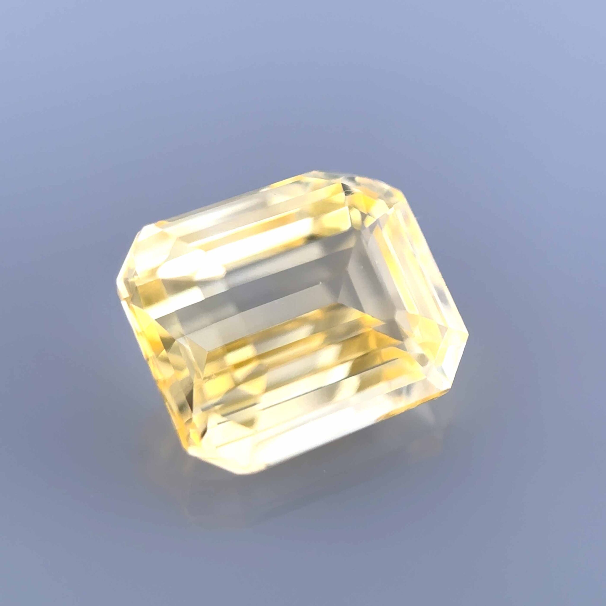 rare yellow sapphire octogonal top stone